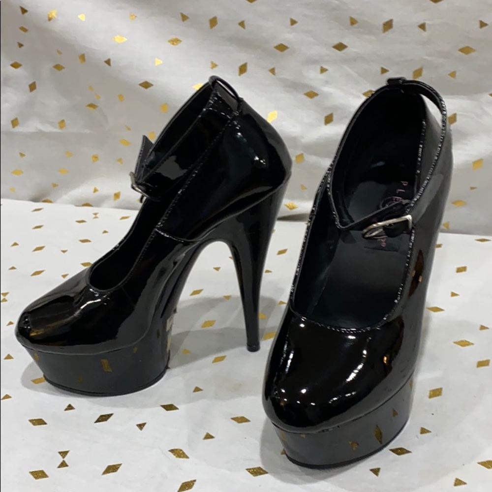 Size 6, 5.5 inch, black Jante strap on heels
